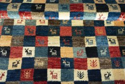 Full view of 2000s Persian Gabbeh rug from Iran / Persia, 146 × 103 cm in Multi Color tones