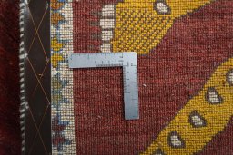 Close-up detail of 2000s Persian Gabbeh rug from Iran / Persia showing Wool weave