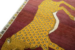 Backside of handmade 2000s Persian Gabbeh rug showing knot structure and weave density