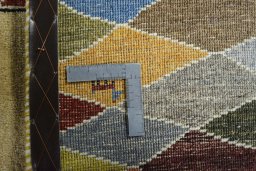 Close-up detail of 2000s Persian Gabbeh rug from Iran / Persia showing Wool weave