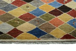 Central medallion detail of 2000s Persian Gabbeh rug from Iran / Persia