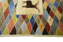 Close-up detail of 2000s Persian Gabbeh rug from Iran / Persia showing Wool weave