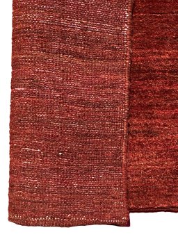 Backside of handmade New Persian Gabbeh rug showing knot structure and weave density