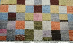 Central medallion detail of 2000s Persian Gabbeh rug from Iran / Persia