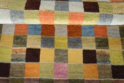 Full view of 2000s Persian Gabbeh rug from Iran / Persia, 141 × 96 cm in Multi Color tones