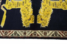 Close-up detail of 2000s Persian Gabbeh rug from Iran / Persia showing Wool weave