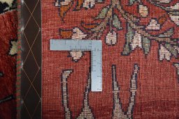 Corner detail of 2000s Persian Gabbeh rug showing border pattern and Wool pile