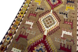 Backside of handmade 2000s Persian Gabbeh rug showing knot structure and weave density