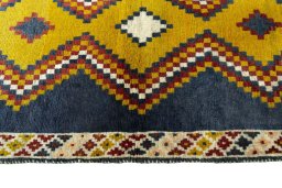 Close-up detail of 2000s Persian Gabbeh rug from Iran / Persia showing Wool weave