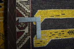 Close-up detail of 2000s Persian Gabbeh rug from Iran / Persia showing Wool weave