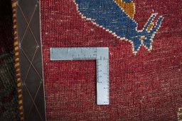 Close-up detail of 2000s Persian Gabbeh rug from Iran / Persia showing Wool weave