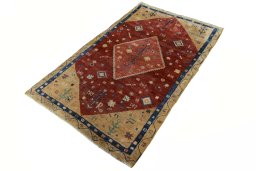 Corner detail of 2000s Persian Gabbeh rug showing border pattern and Wool pile