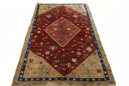 Surface texture of 2000s Persian Gabbeh rug with natural Wool and intricate pattern