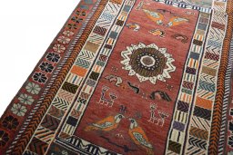 Backside of handmade 2000s Persian Gabbeh rug showing knot structure and weave density