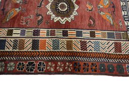 Full view of 2000s Persian Gabbeh rug from Iran / Persia, 161 × 106 cm in Red tones