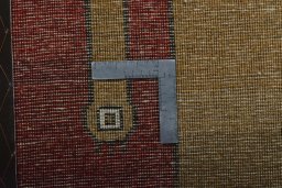 Corner detail of 2000s Persian Gabbeh rug showing border pattern and Wool pile