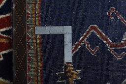 Close-up detail of 2000s Persian Gabbeh rug from Iran / Persia showing Wool weave