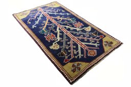 Close-up detail of 2000s Persian Gabbeh rug from Iran / Persia showing Wool weave