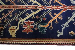 Close-up detail of 2000s Persian Gabbeh rug from Iran / Persia showing Wool weave