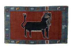 Full view of 2000s Persian Gabbeh rug from Iran / Persia, 132 × 81 cm in Red tones