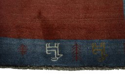 Central medallion detail of 2000s Persian Gabbeh rug from Iran / Persia