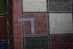Close-up detail of 2000s Persian Gabbeh rug from Iran / Persia showing Wool weave