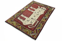 Corner detail of 2000s Persian Gabbeh rug showing border pattern and Wool pile