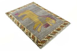 Close-up detail of 2000s Persian Gabbeh rug from Iran / Persia showing Wool weave
