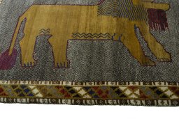 Close-up detail of 2000s Persian Gabbeh rug from Iran / Persia showing Wool weave