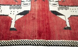 Close-up detail of 2000s Persian Gabbeh rug from Iran / Persia showing Wool weave