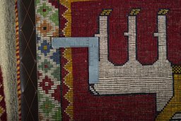 Close-up detail of 2000s Persian Gabbeh rug from Iran / Persia showing Wool weave