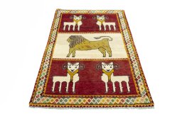 Surface texture of 2000s Persian Gabbeh rug with natural Wool and intricate pattern