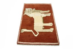 Surface texture of 2000s Persian Gabbeh rug with natural Wool and intricate pattern