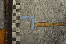 Close-up detail of 2000s Persian Gabbeh rug from Iran / Persia showing Wool weave