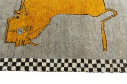 Close-up detail of 2000s Persian Gabbeh rug from Iran / Persia showing Wool weave