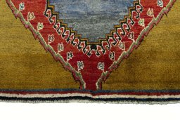 Central medallion detail of 2000s Persian Gabbeh rug from Iran / Persia