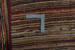 Close-up detail of 2000s Persian Gabbeh rug from Iran / Persia showing Wool weave