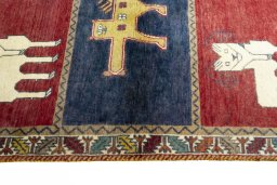 Close-up detail of 2000s Persian Gabbeh rug from Iran / Persia showing Wool weave