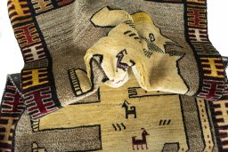 Corner detail of 2000s Persian Gabbeh rug showing border pattern and Wool pile