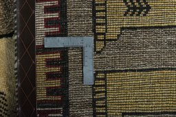 Close-up detail of 2000s Persian Gabbeh rug from Iran / Persia showing Wool weave