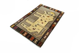Corner detail of 2000s Persian Gabbeh rug showing border pattern and Wool pile