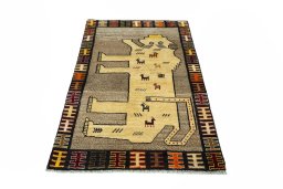 Surface texture of 2000s Persian Gabbeh rug with natural Wool and intricate pattern