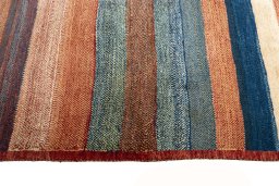 Close-up detail of 2000s Persian Gabbeh rug from Iran / Persia showing Wool weave