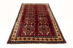 Surface texture of 2000s Persian Gabbeh rug with natural Wool and intricate pattern
