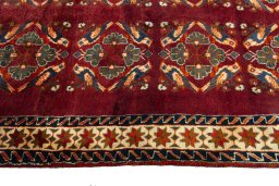 Close-up detail of 2000s Persian Gabbeh rug from Iran / Persia showing Wool weave