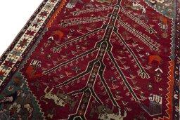 Backside of handmade 2000s Persian Gabbeh rug showing knot structure and weave density