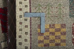 Close-up detail of 2000s Persian Gabbeh rug from Iran / Persia showing Wool weave