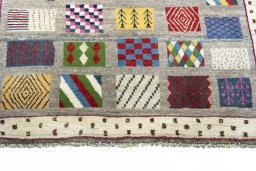 Central medallion detail of 2000s Persian Gabbeh rug from Iran / Persia