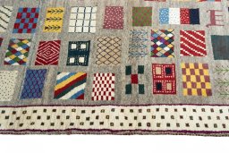 Close-up detail of 2000s Persian Gabbeh rug from Iran / Persia showing Wool weave