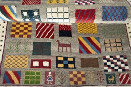 Full view of 2000s Persian Gabbeh rug from Iran / Persia, 150 × 107 cm in Multi Color tones